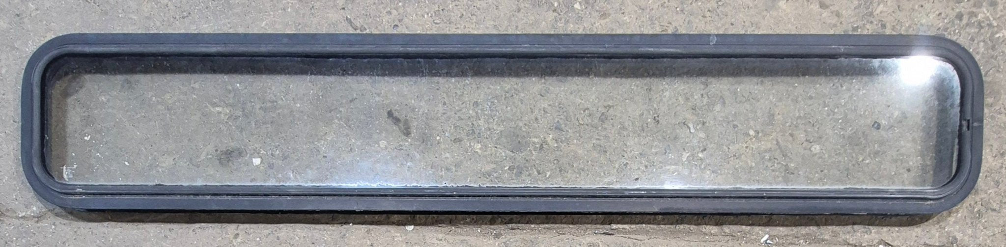 Used Black Radius Non Opening Window : 72 1/4" W x 11 3/4" H x 1 7/8" - Young Farts RV Parts