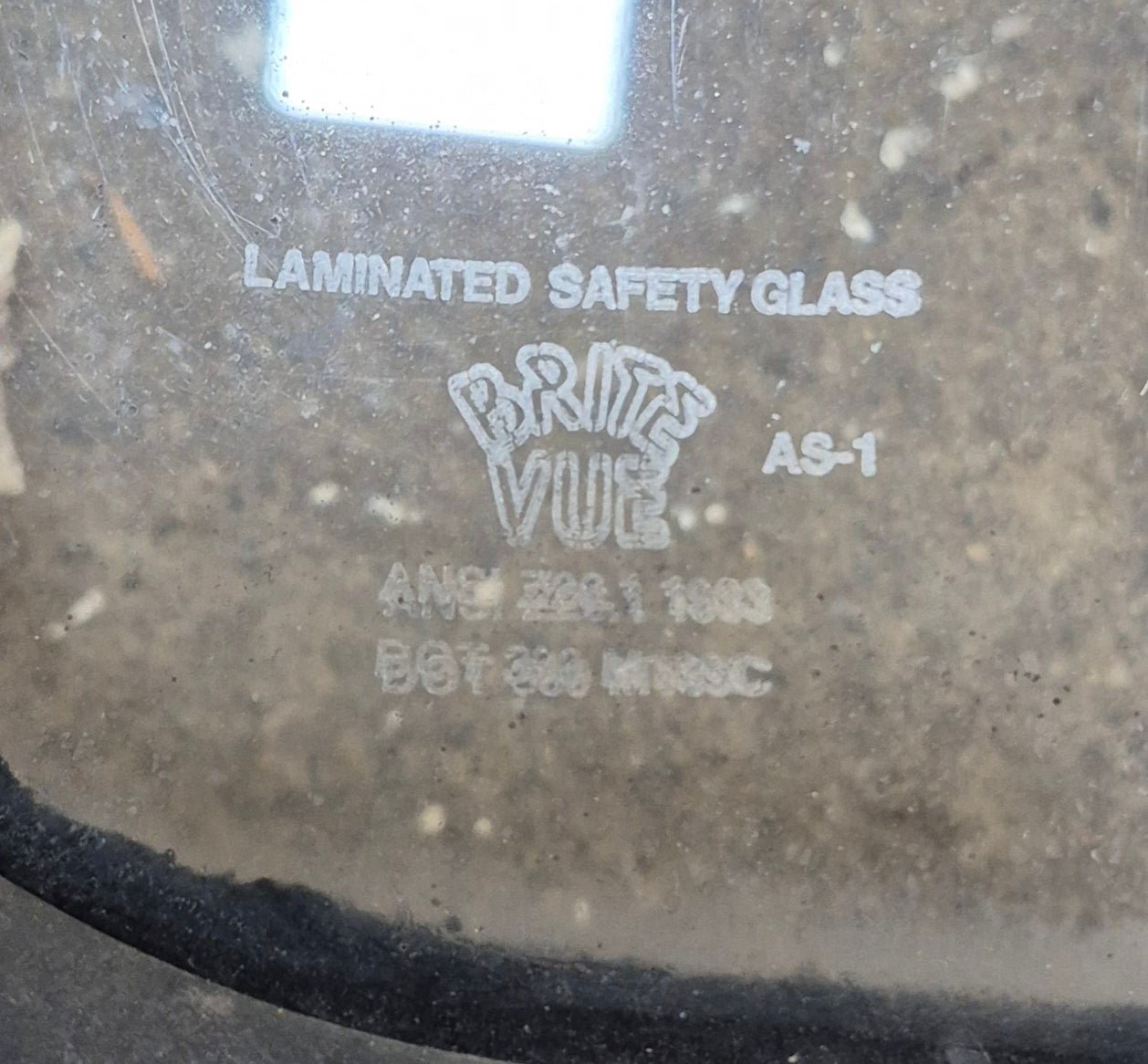 Used Black Radius Non Opening Window : 72 1/4" W x 11 3/4" H x 1 7/8" - Young Farts RV Parts