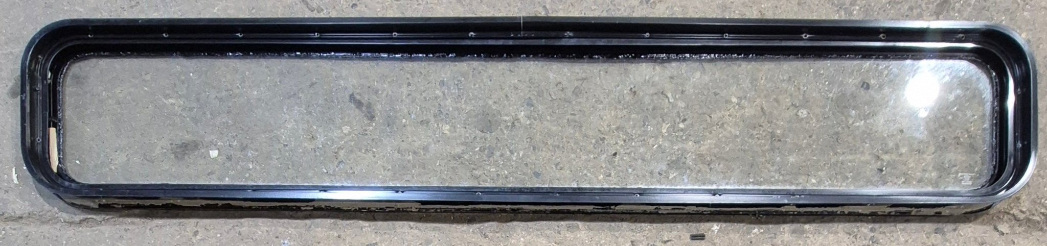 Used Black Radius Non Opening Window : 72 1/4" W x 11 3/4" H x 1 7/8" - Young Farts RV Parts