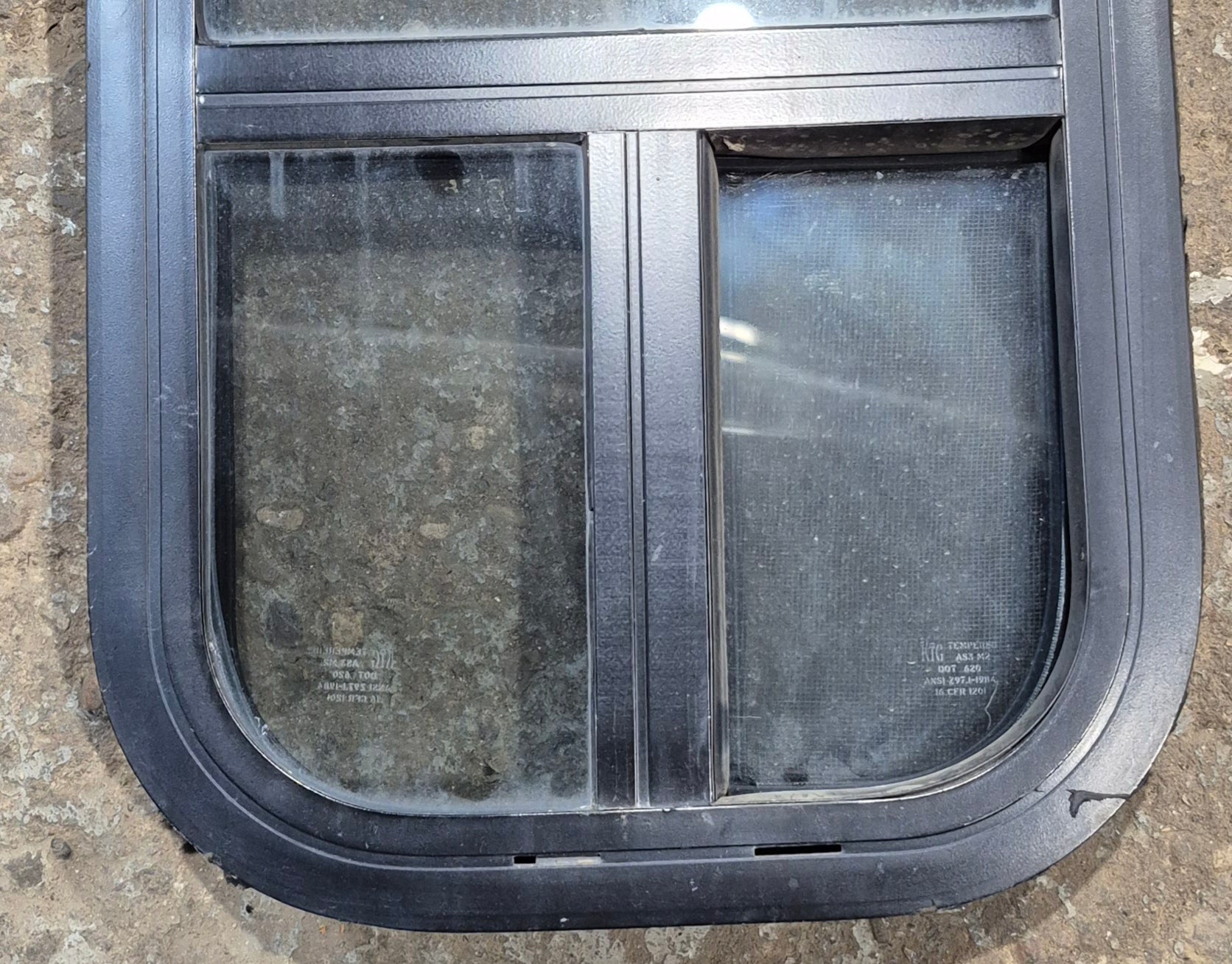 Used Black Radius Opening Window : 11 1/2" W x 21 1/4" H x 1 3/4" D - Young Farts RV Parts