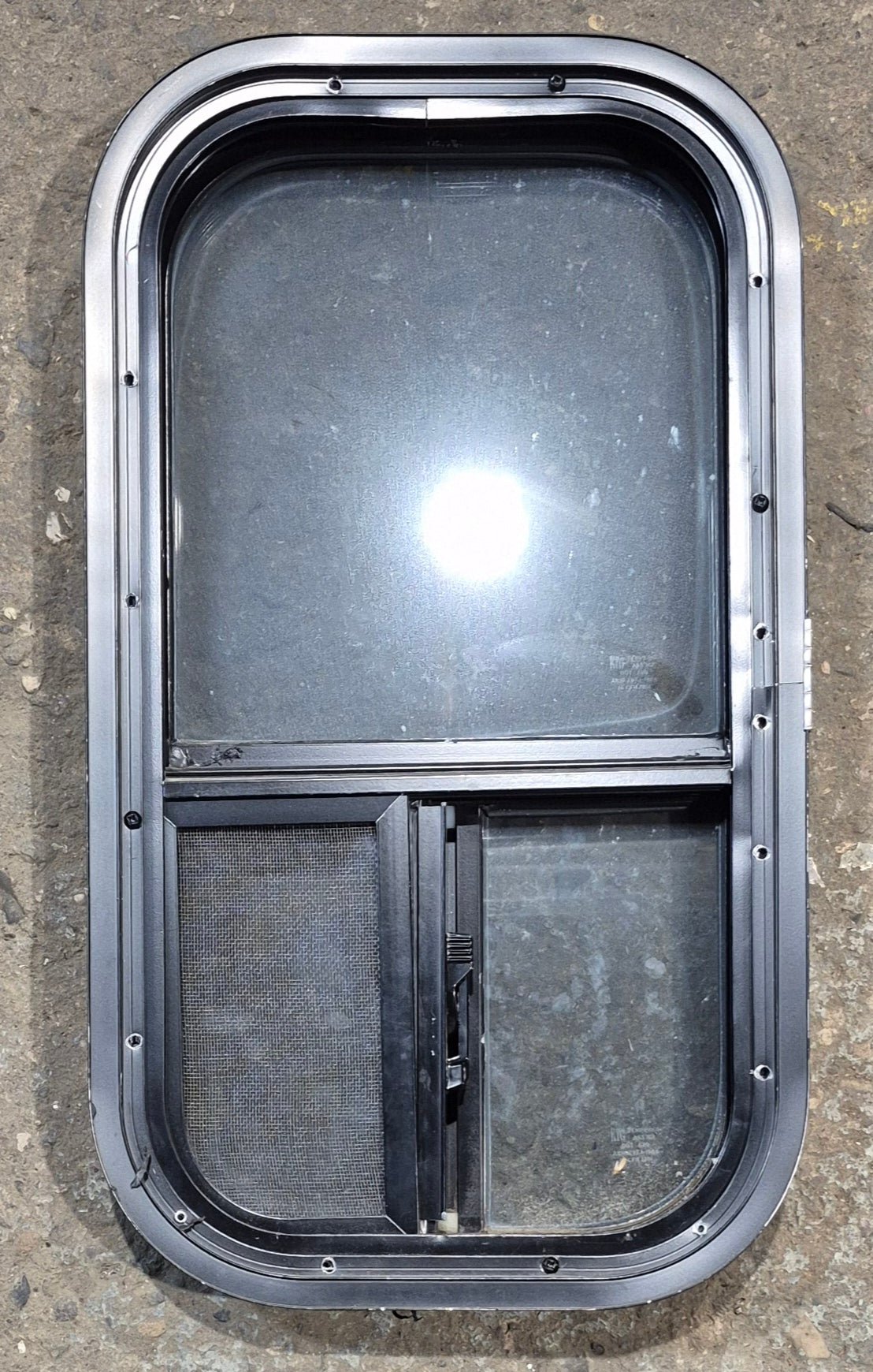 Used Black Radius Opening Window : 11 1/2" W x 21 1/4" H x 1 3/4" D - Young Farts RV Parts