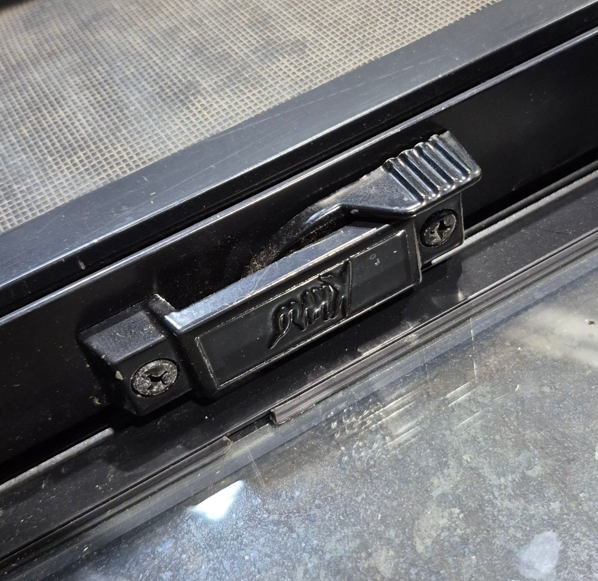 Used Black Radius Opening Window : 11 1/2" W x 21 1/4" H x 1 3/4" D - Young Farts RV Parts