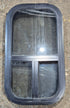 Used Black Radius Opening Window : 11 1/2" W x 21 1/4" H x 1 3/4" D - Young Farts RV Parts