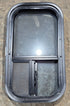 Used Black Radius Opening Window : 11 1/2" W x 21 1/4" H x 1 3/4" D - Young Farts RV Parts