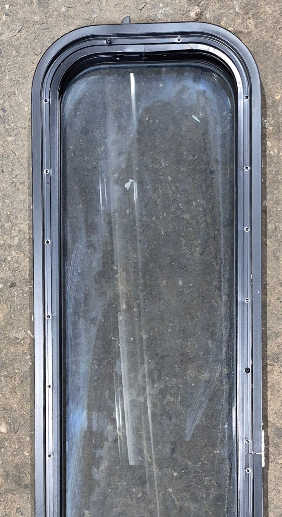 Used Black Radius Opening Window : 11 1/4" W x 47 1/4" H x 1 3/4" D - Young Farts RV Parts
