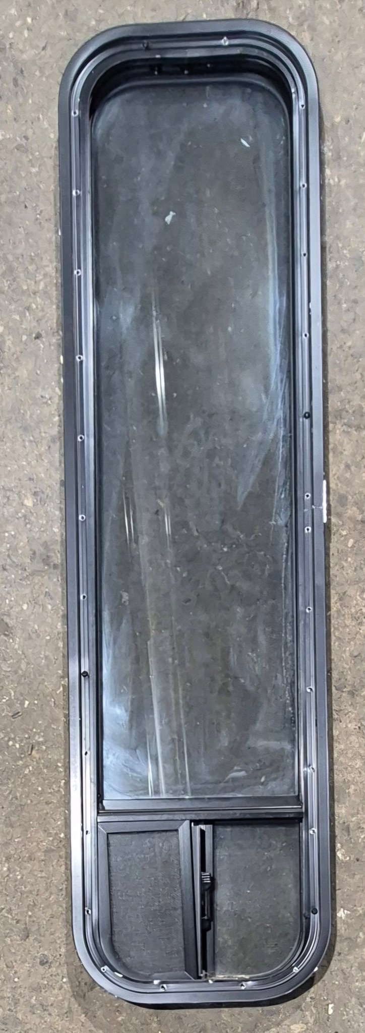 Used Black Radius Opening Window : 11 1/4" W x 47 1/4" H x 1 3/4" D - Young Farts RV Parts