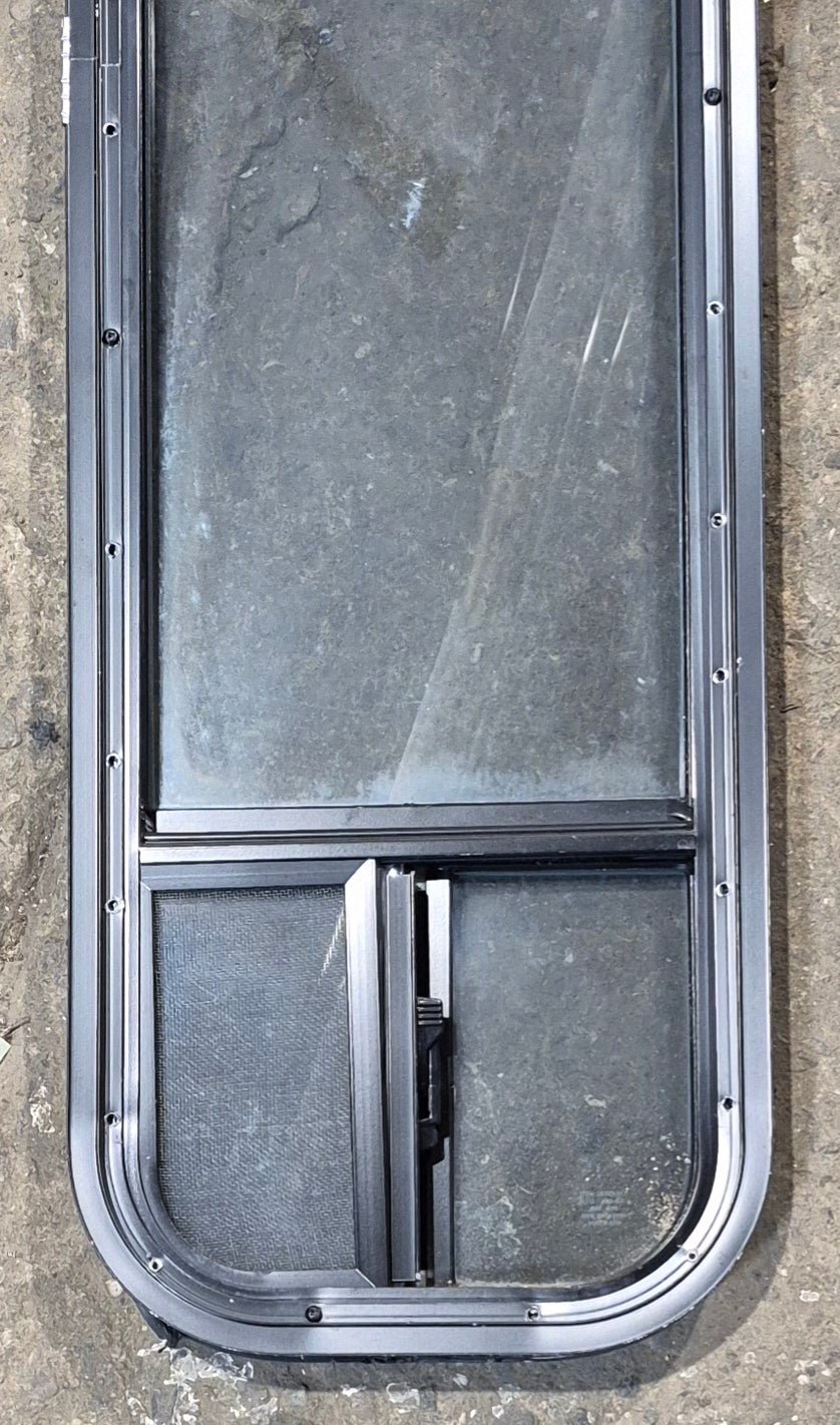 Used Black Radius Opening Window : 11 1/4" W x 47 1/4" H x 1 3/4" D - Young Farts RV Parts