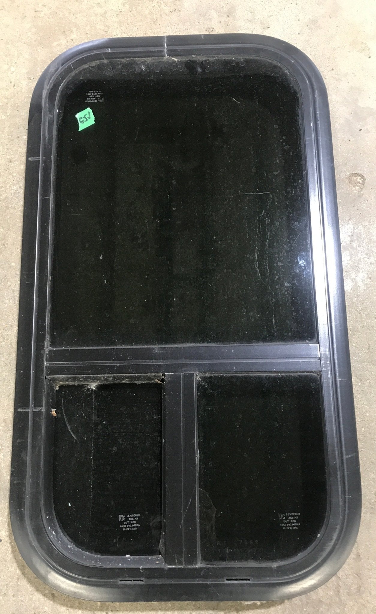 Used Black Radius Opening Window : 13 1/2" W x 25 1/2" H x 1 7/8" D - Young Farts RV Parts