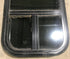 Used Black Radius Opening Window : 13 1/2" W x 25 1/2" H x 1 7/8" D - Young Farts RV Parts