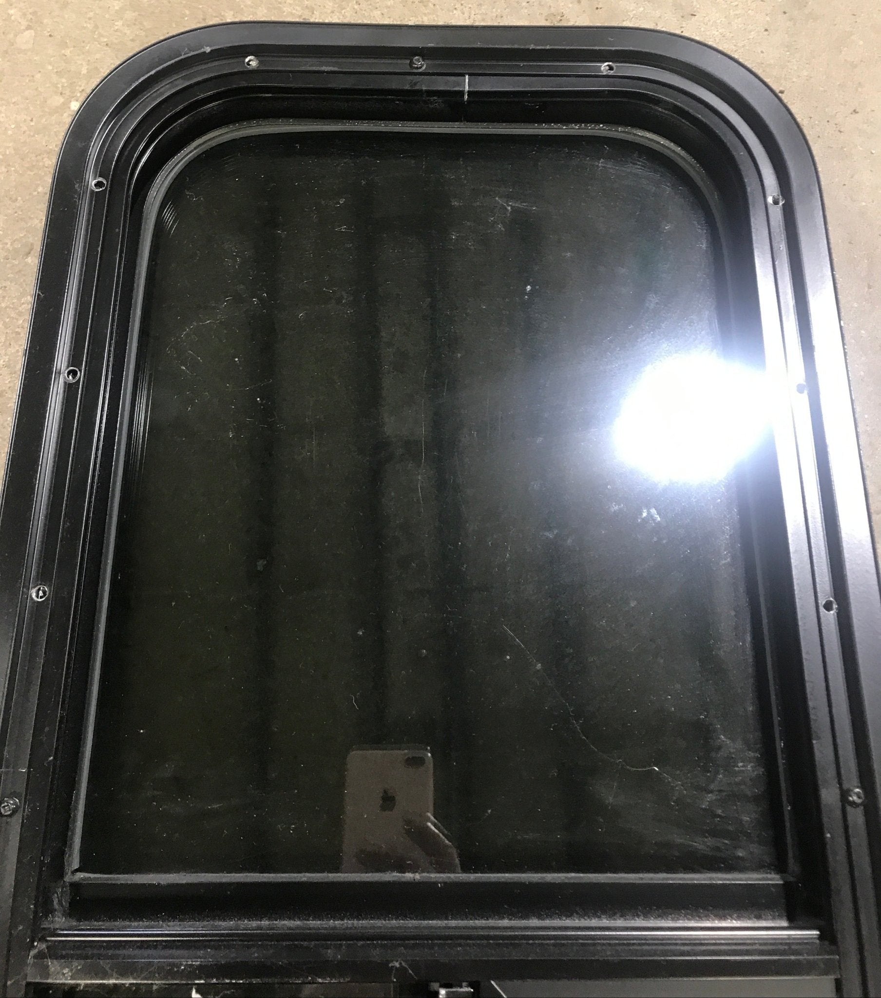 Used Black Radius Opening Window : 13 1/2" W x 25 1/2" H x 1 7/8" D - Young Farts RV Parts