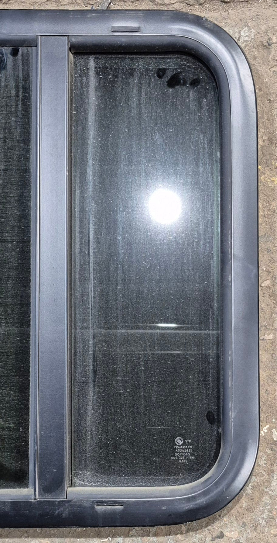 Used Black Radius Opening Window : 17 1/2" W x 21 1/2" H x 1 1/4" - Young Farts RV Parts