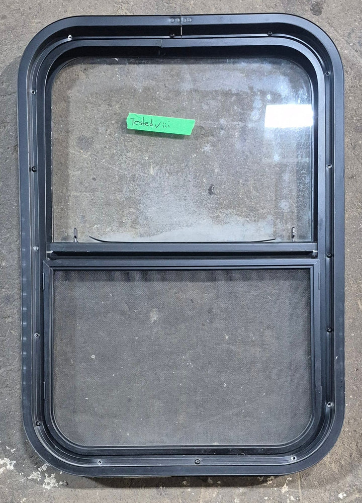 Used Black Radius Opening Window : 17 1/2" W x 25 1/4" H x 1 7/8" D - Young Farts RV Parts