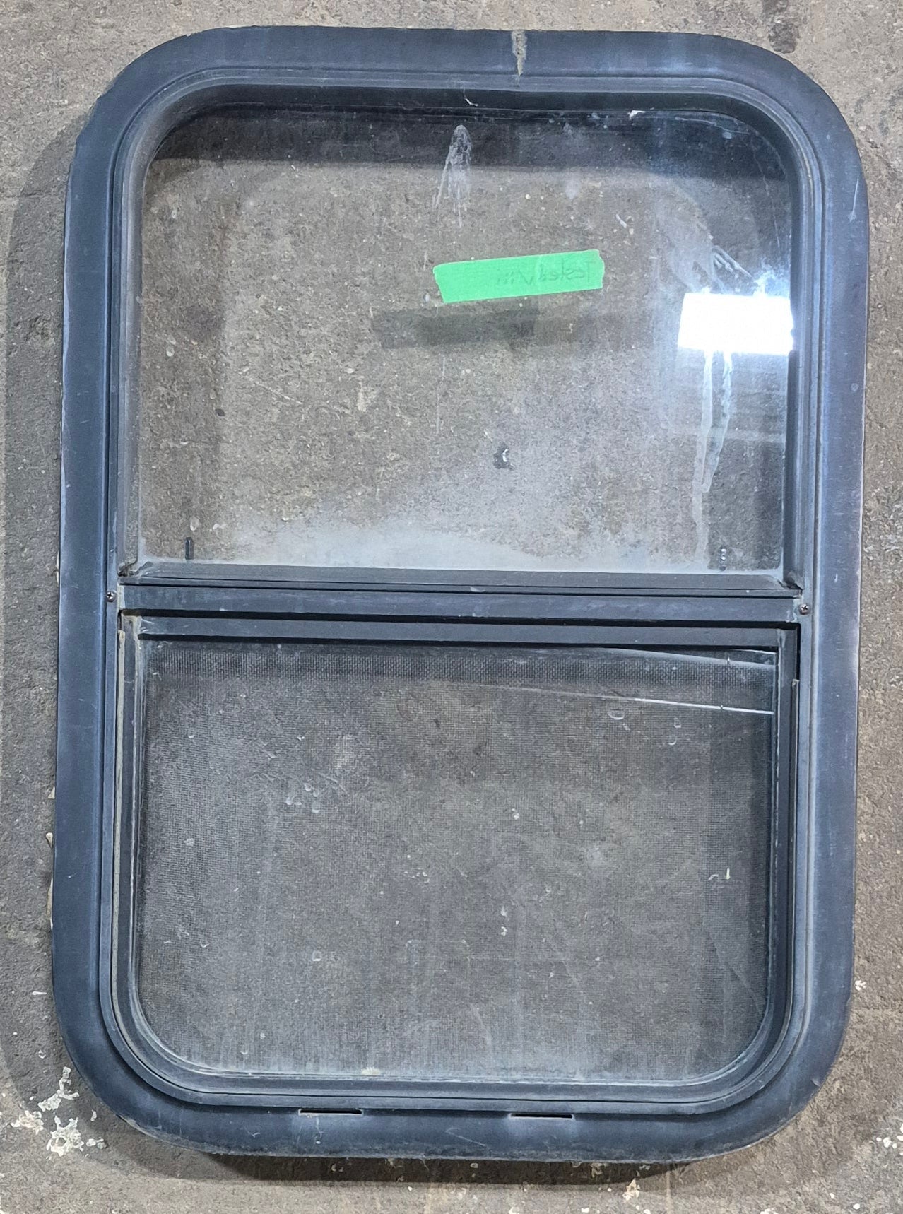 Used Black Radius Opening Window : 17 1/2" W x 25 1/4" H x 1 7/8" D - Young Farts RV Parts