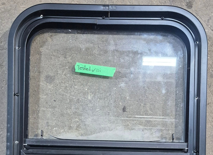 Used Black Radius Opening Window : 17 1/2" W x 25 1/4" H x 1 7/8" D - Young Farts RV Parts