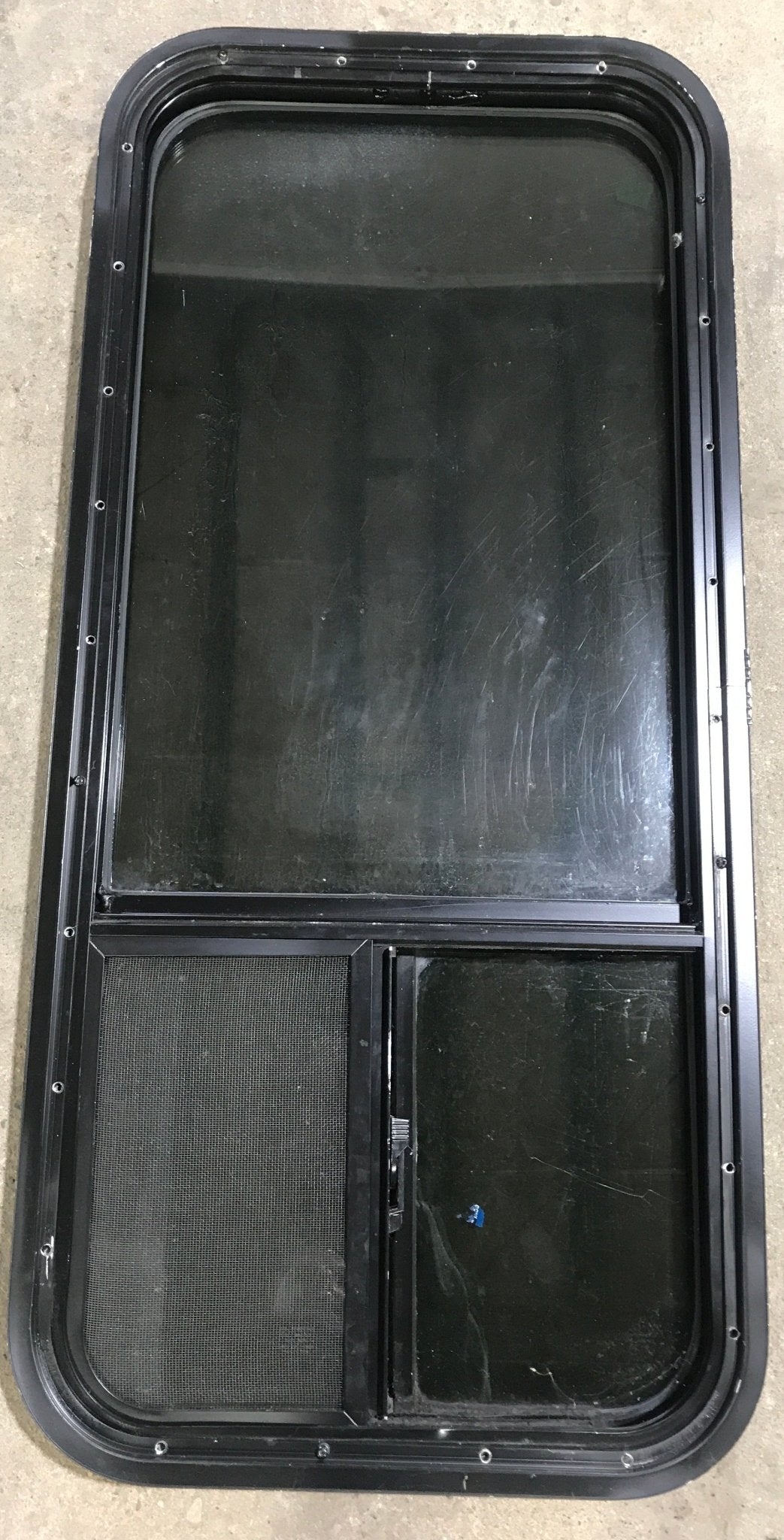 Used Black Radius Opening Window : 17 1/2" W x 39 1/2" H x 1 7/8" D - Young Farts RV Parts