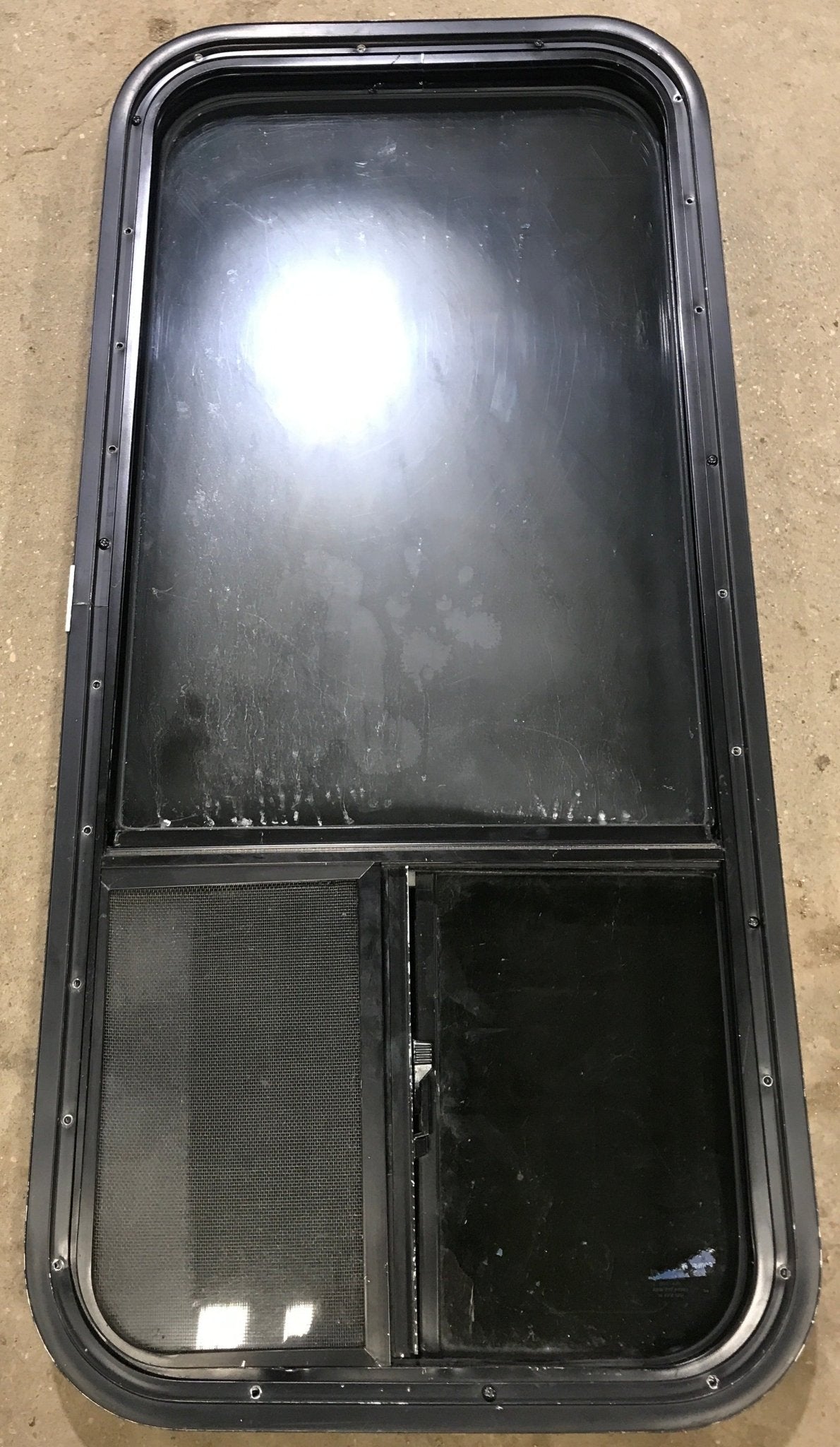 Used Black Radius Opening Window : 17 1/2" W x 39 1/2" H x 1 7/8" D - Young Farts RV Parts