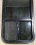 Used Black Radius Opening Window : 17 1/2" W x 39 1/2" H x 1 7/8" D - Young Farts RV Parts
