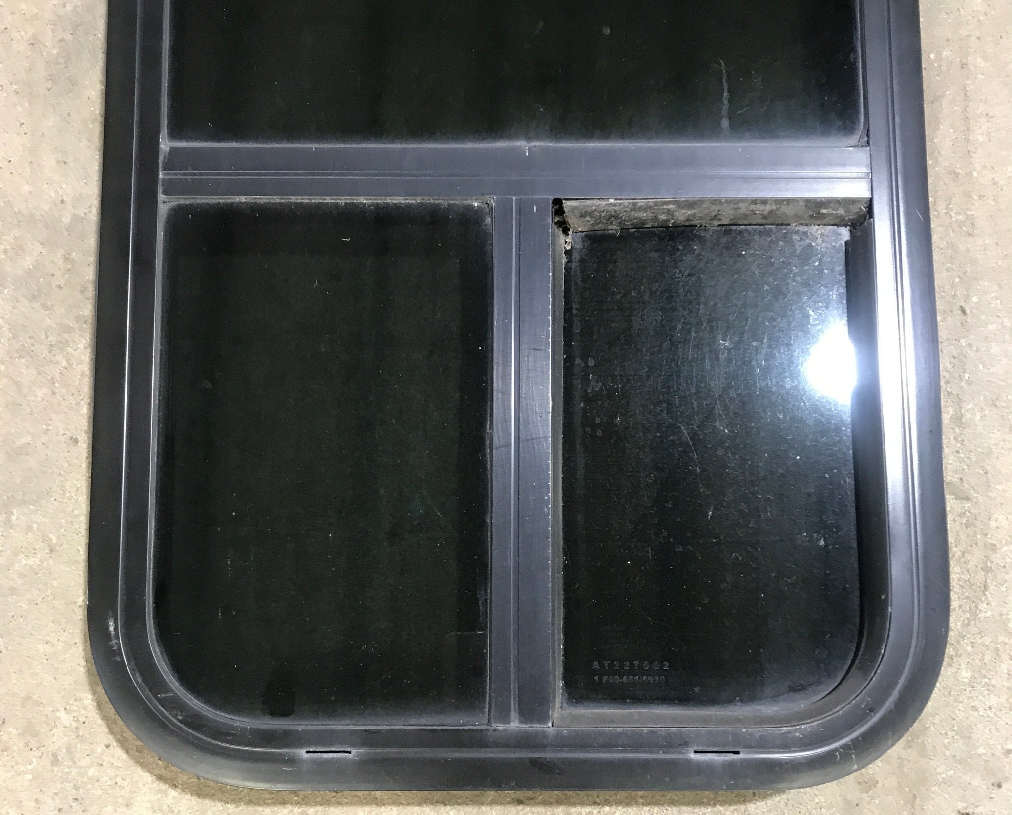 Used Black Radius Opening Window : 17 1/2" W x 39 1/2" H x 1 7/8" D - Young Farts RV Parts
