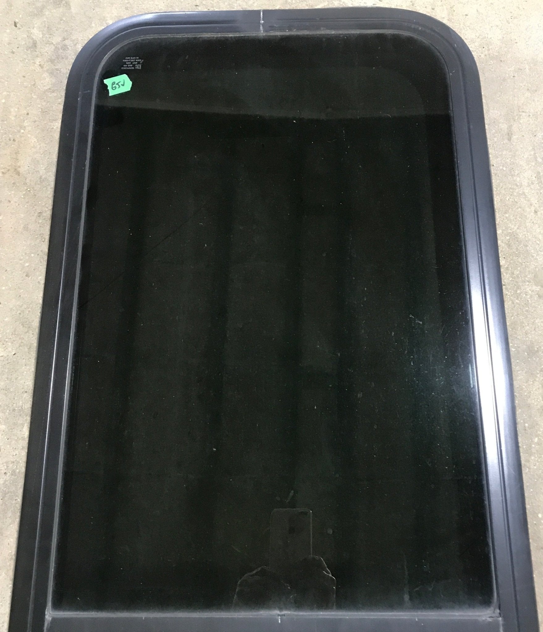 Used Black Radius Opening Window : 17 1/2" W x 39 1/2" H x 1 7/8" D - Young Farts RV Parts