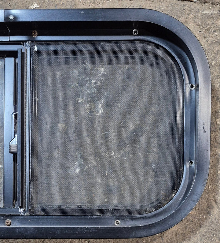 Used Black Radius Opening Window : 20 3/4" W x 10 3/4" H x 1 7/8" - Young Farts RV Parts