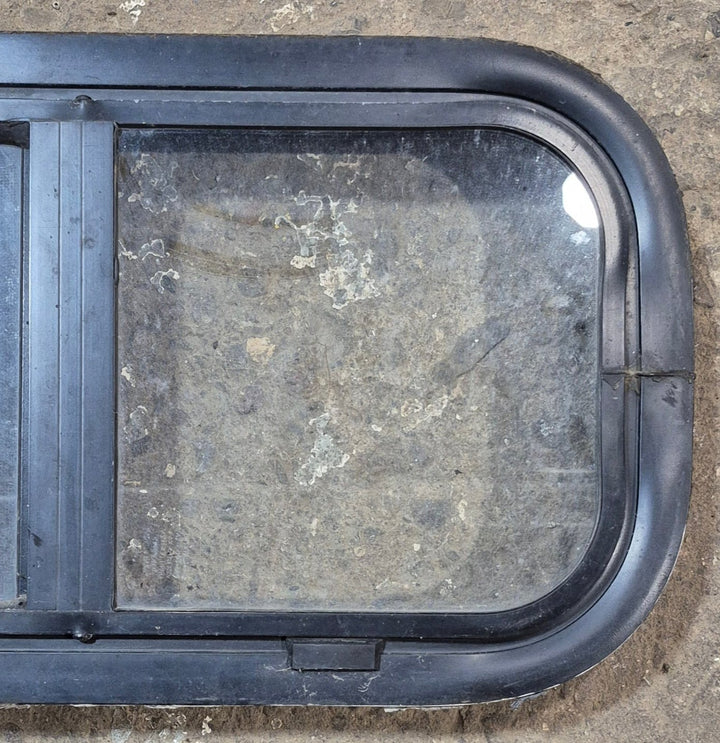 Used Black Radius Opening Window : 20 3/4" W x 10 3/4" H x 1 7/8" - Young Farts RV Parts