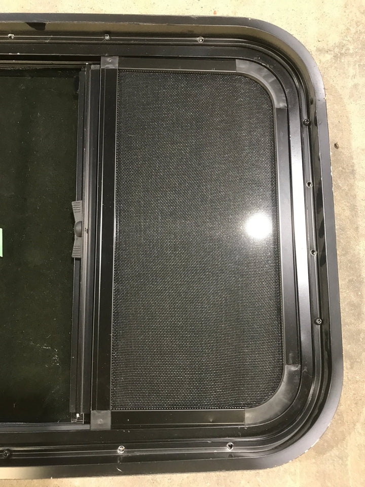 Used Black Radius Opening Window : 21 1/2" W X 17 1/2" H X 1 3/4" D - Young Farts RV Parts