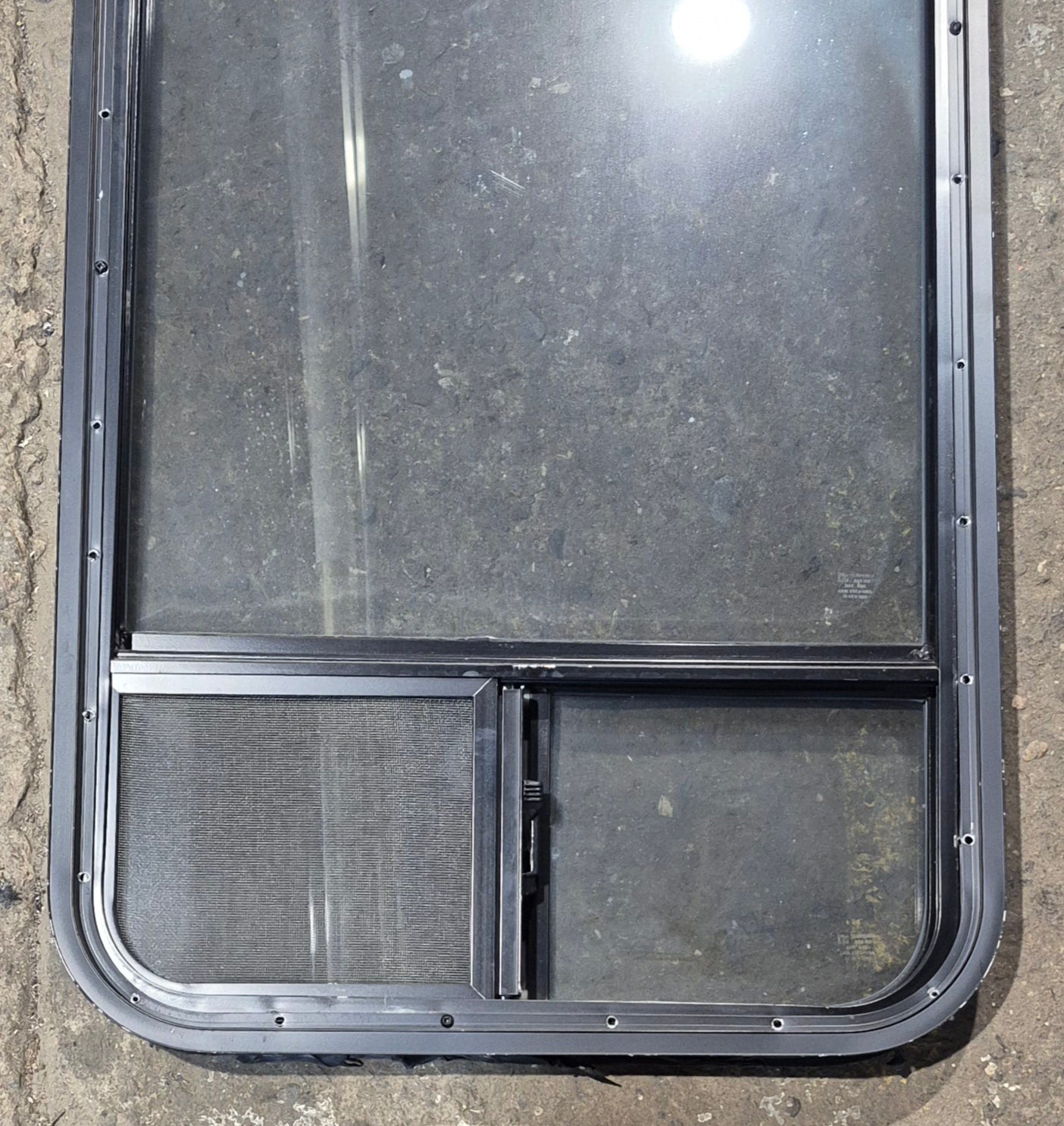 Used Black Radius Opening Window : 21 1/4" W x 47 1/4" H x 1 3/4" D - Young Farts RV Parts