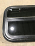 Used Black Radius Opening Window : 23 1/2" W x 14 1/2" H x 1 7/8" - Young Farts RV Parts