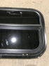 Used Black Radius Opening Window : 23 1/2" W x 14 1/2" H x 1 7/8" - Young Farts RV Parts