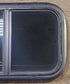 Used Black Radius Opening Window : 23 1/2" W x 14 1/2" H x 1 7/8" D - Young Farts RV Parts