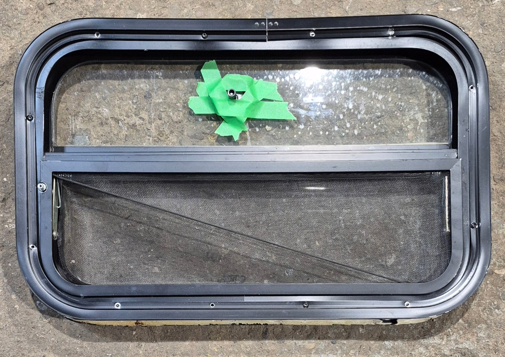 Used Black Radius Opening Window : 23 1/2" W x 14 1/4" H x 1 7/8" - Young Farts RV Parts