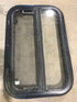 Used Black Radius Opening Window : 23 1/2" W x 14 3/4" H x 2" - Young Farts RV Parts
