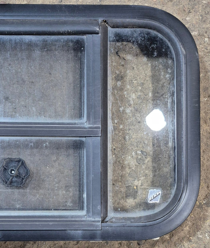 Used Black Radius Opening Window : 23 1/2" W x 14 3/4" H x 2" - Young Farts RV Parts