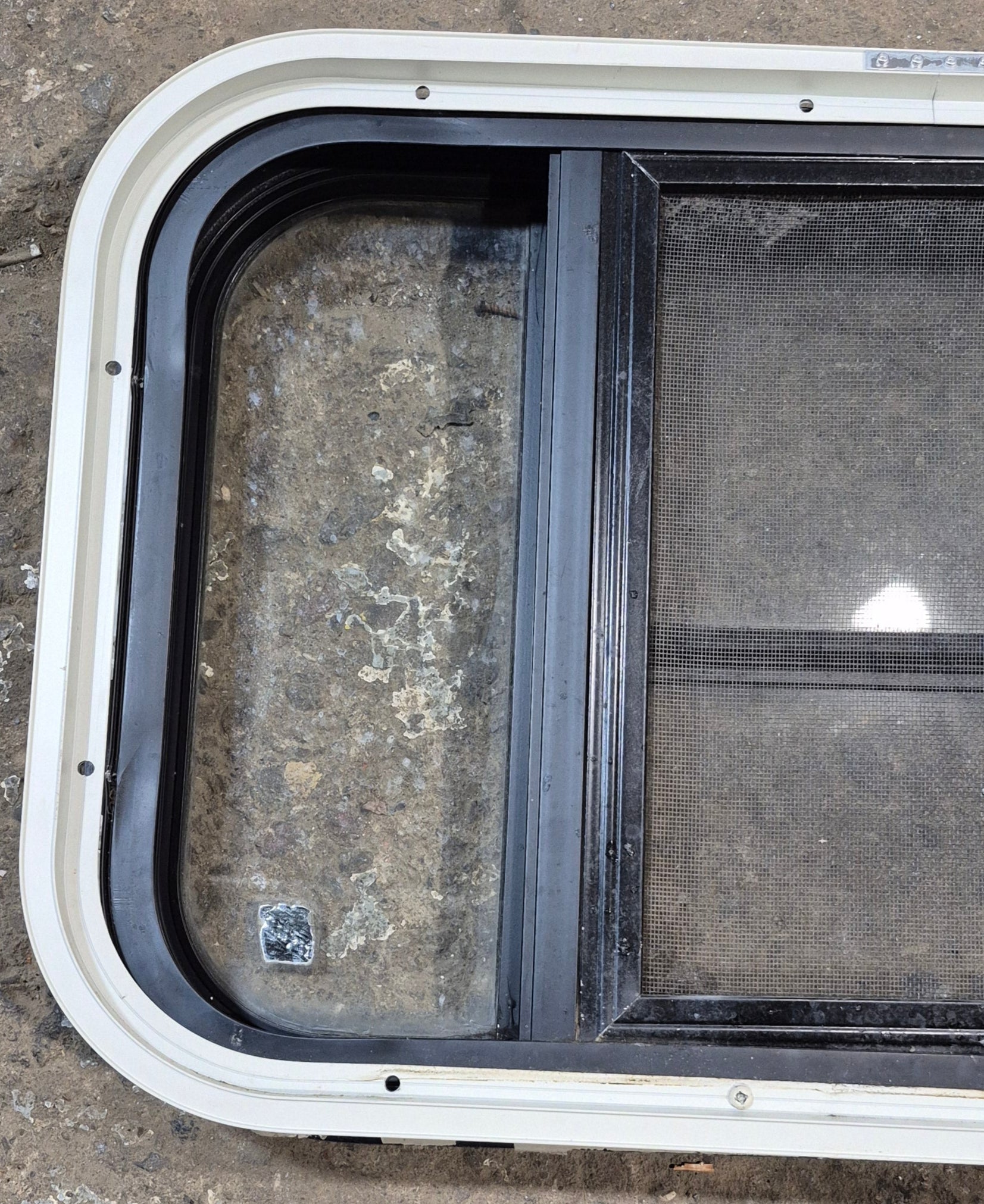 Used Black Radius Opening Window : 23 1/2" W x 14 3/4" H x 2" - Young Farts RV Parts