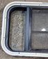 Used Black Radius Opening Window : 23 1/2" W x 14 3/4" H x 2" - Young Farts RV Parts