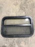 Used Black Radius Opening Window : 23 1/2" W x 14 3/4" H x 2" - Young Farts RV Parts
