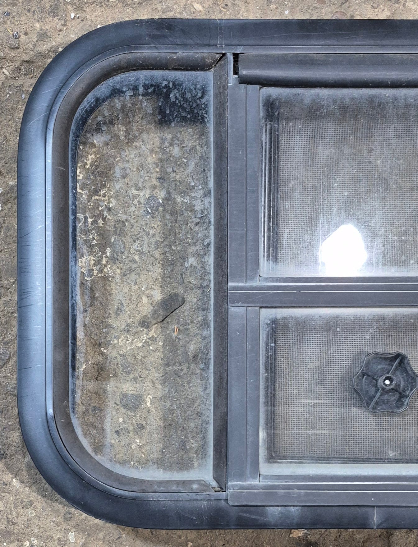Used Black Radius Opening Window : 23 1/2" W x 14 3/4" H x 2" - Young Farts RV Parts