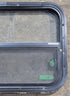 Used Black Radius Opening Window : 23 1/2" W x 17 1/4" H x 1 7/8" D - Young Farts RV Parts