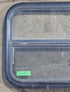 Used Black Radius Opening Window : 23 1/2" W x 17 1/4" H x 1 7/8" D - Young Farts RV Parts