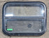 Used Black Radius Opening Window : 23 1/2" W x 17 1/4" H x 1 7/8" D - Young Farts RV Parts