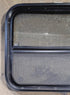 Used Black Radius Opening Window : 23 1/2" W x 19 1/4" H x 1 7/8" - Young Farts RV Parts