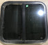 Used Black Radius Opening Window : 23 1/2" W x 21 1/2" H x 1 7/8" D - Young Farts RV Parts
