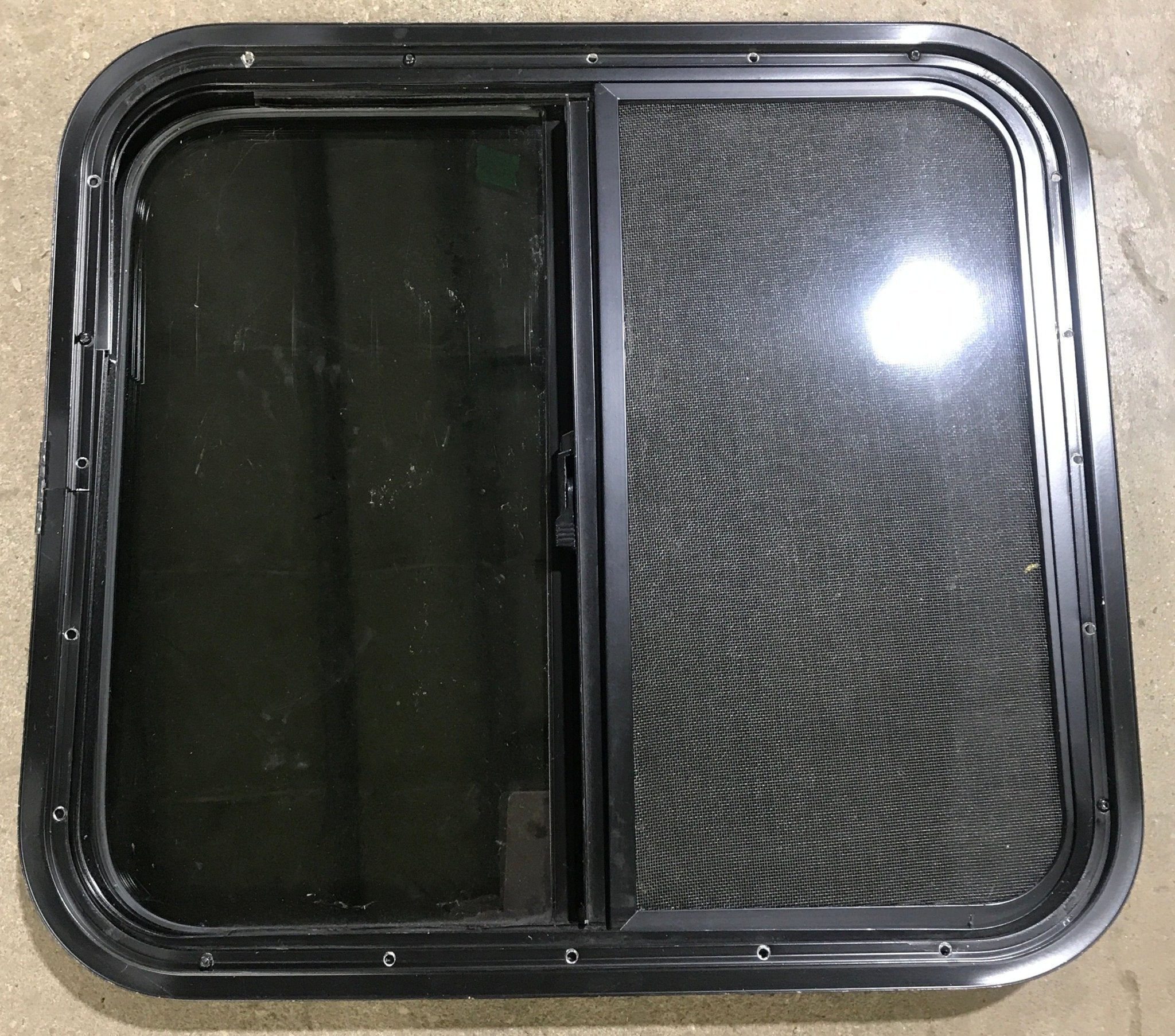 Used Black Radius Opening Window : 23 1/2" W x 21 1/2" H x 1 7/8" D - Young Farts RV Parts