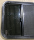 Used Black Radius Opening Window : 23 1/2" W x 21 1/2" H x 1 7/8" D - Young Farts RV Parts
