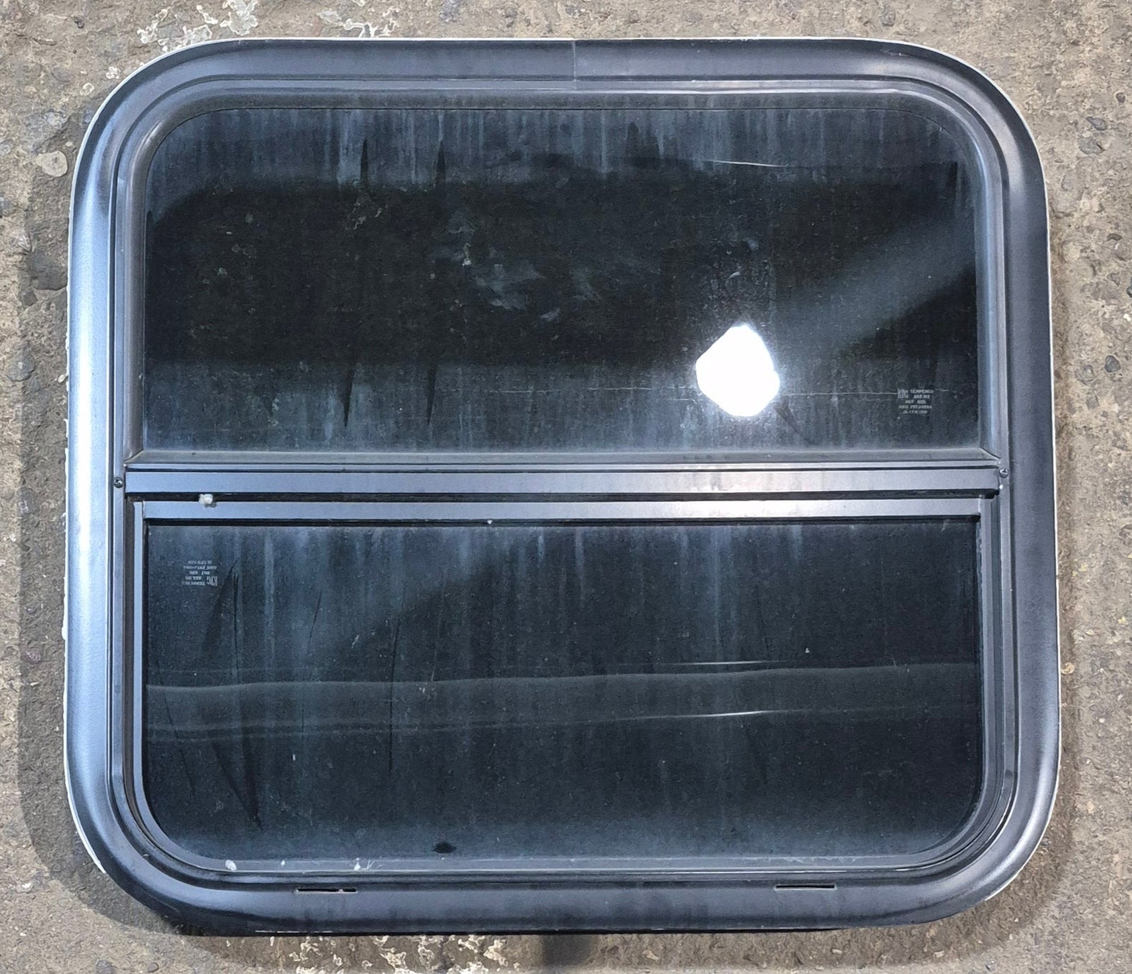 Used Black Radius Opening Window : 23 1/2" W x 21 1/4" H x 1 3/4" - Young Farts RV Parts