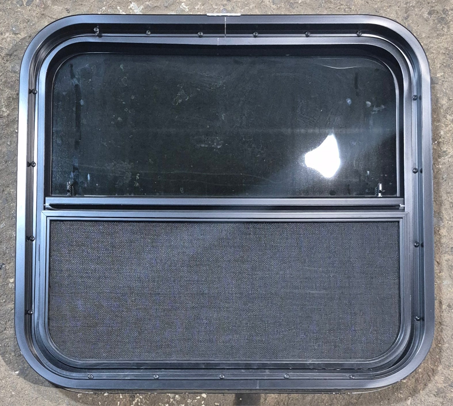 Used Black Radius Opening Window : 23 1/2" W x 21 1/4" H x 1 3/4" - Young Farts RV Parts