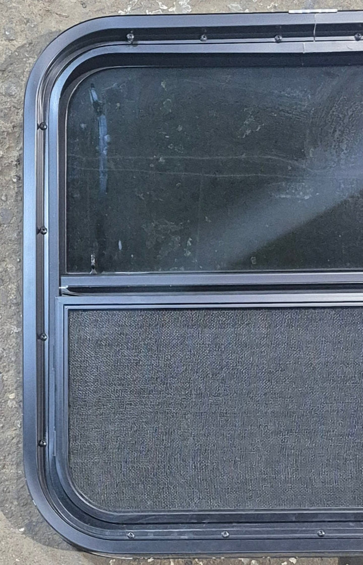 Used Black Radius Opening Window : 23 1/2" W x 21 1/4" H x 1 3/4" - Young Farts RV Parts