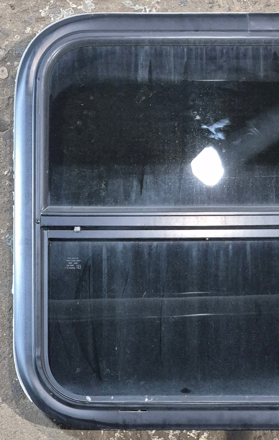 Used Black Radius Opening Window : 23 1/2" W x 21 1/4" H x 1 3/4" - Young Farts RV Parts
