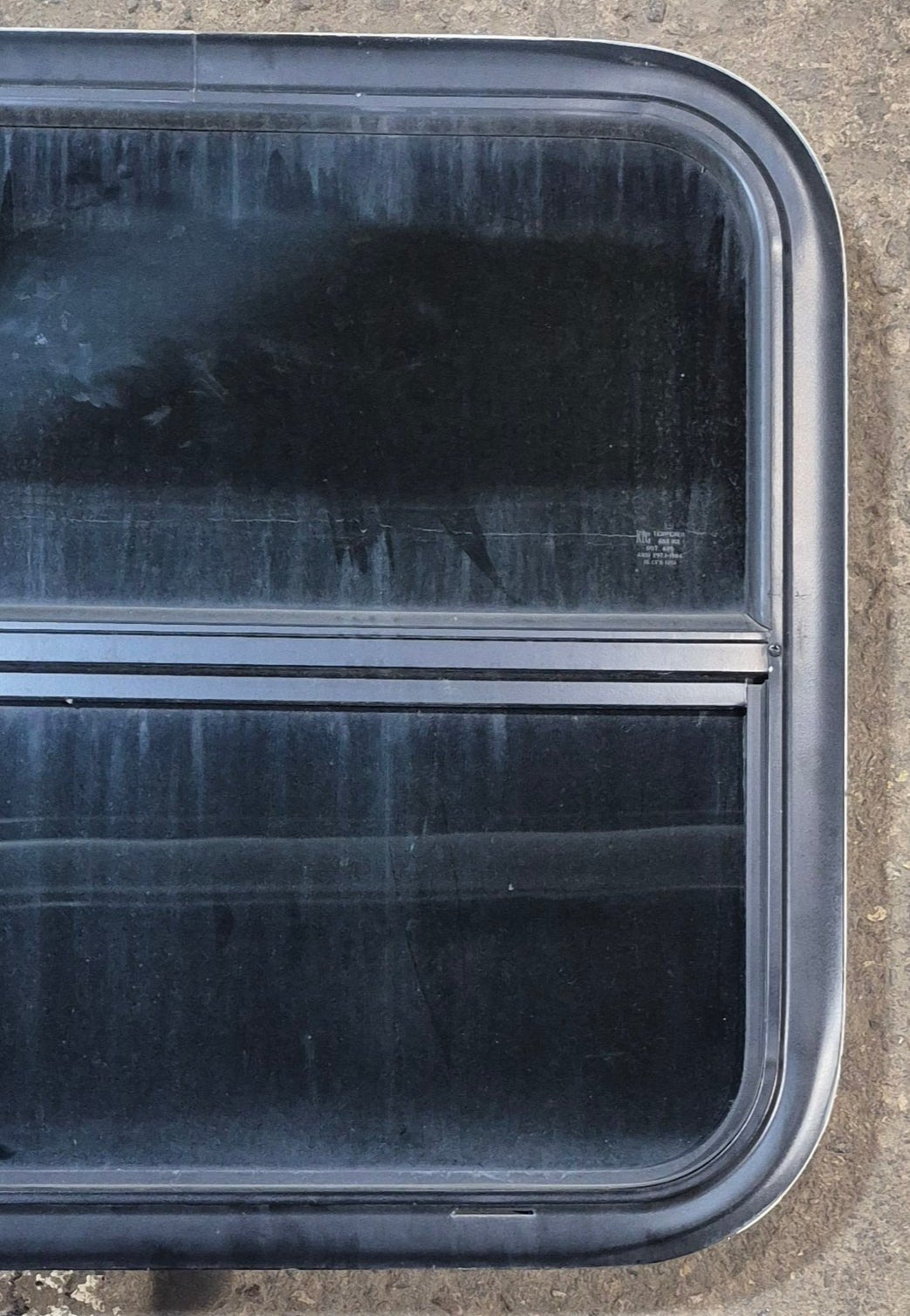 Used Black Radius Opening Window : 23 1/2" W x 21 1/4" H x 1 3/4" - Young Farts RV Parts
