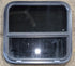 Used Black Radius Opening Window : 23 1/2" W x 21 1/4" H x 2" - Young Farts RV Parts